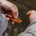 Zwijacz zużytej żyłki Smith Creek Spent Line Wrangler – Orange, ujęcie 4