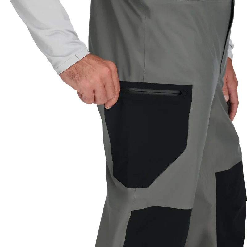 Spodnie przeciwdeszczowe Simms Vapor Elite Bib Gunmetal – kieszeń na udzie na zamek